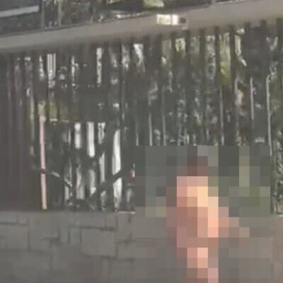 Mulher nua anda pelo Centro de Nova Friburgo nesta terça-feira