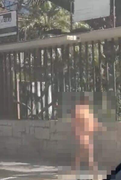 Mulher nua anda pelo Centro de Nova Friburgo nesta terça-feira
