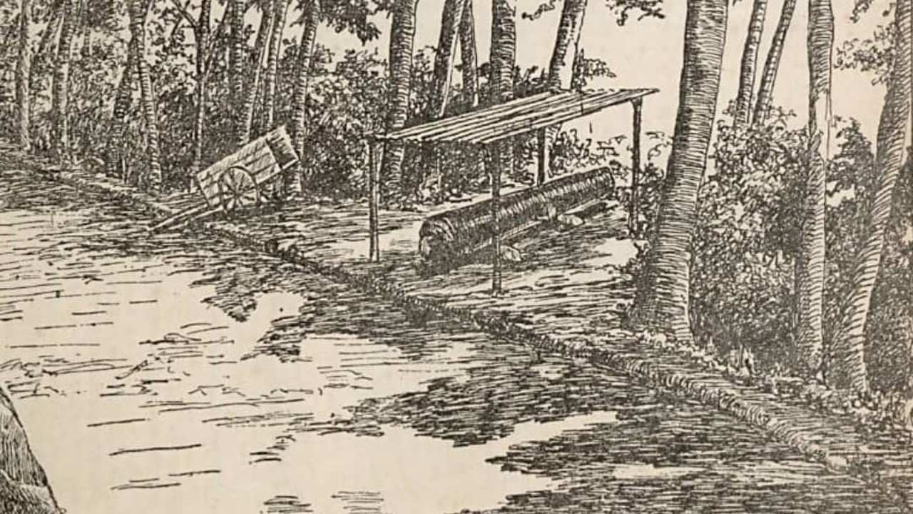 Gravura da Fortaleza de Jacarepaguá, com canhão sob abrigo e carrinho de transporte.