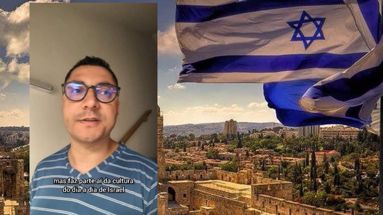 Homem fala sobre Israel com a bandeira e paisagem ao fundo