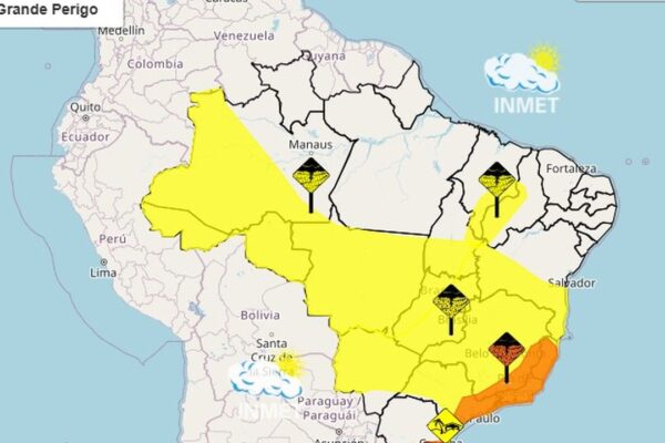 Mapa de alerta meteorológico no Brasil: áreas de perigo para tempestades em amarelo e vermelho, com foco no Rio de Janeiro.