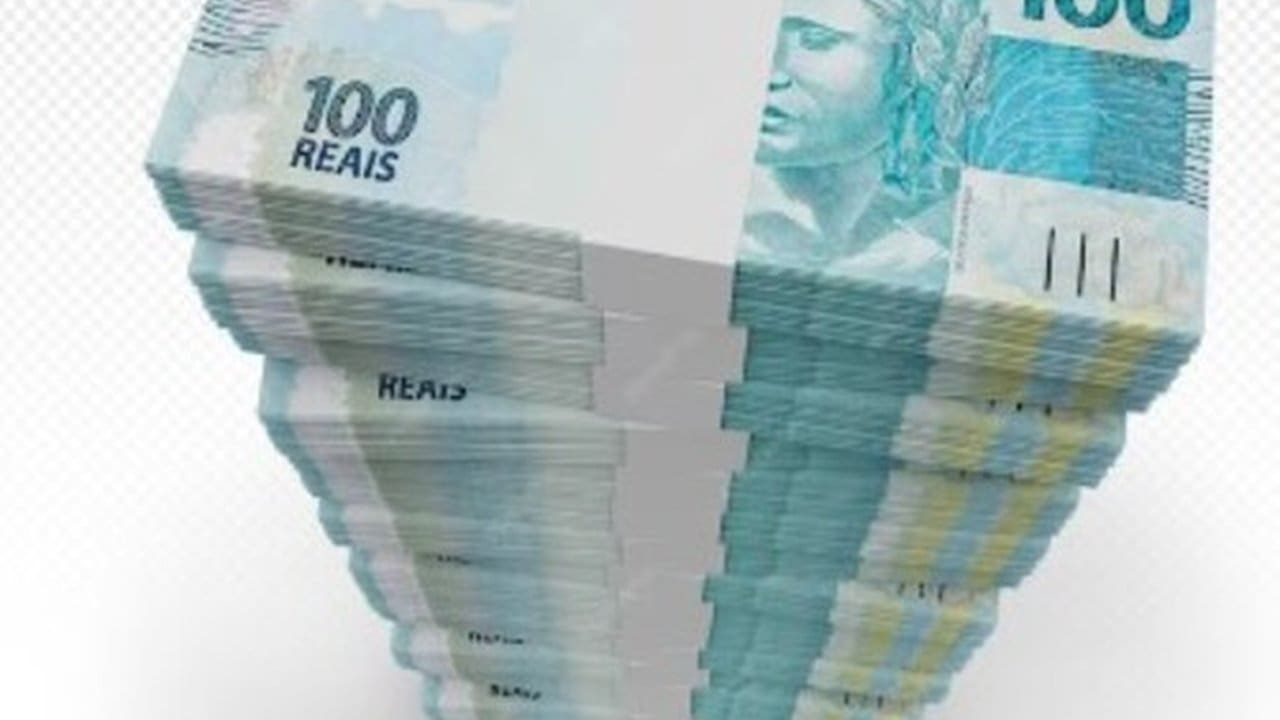 Pilhas de notas de 100 reais, representando dinheiro e finanças.