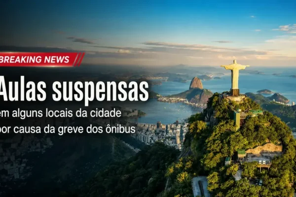 Imagem horizontal mostra a cidade do Rio de Janeiro vista do alto, com o Cristo Redentor em destaque, e texto informando aulas suspensas em alguns locais por causa da greve dos ônibus.