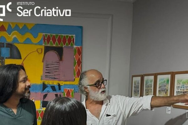Evento cultural em Nova Friburgo (RJ): apresentação e diálogo com público.