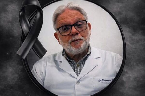 Homenagem ao Dr. José Domenico Sanglard Balbi, médico cardiologista de Nova Friburgo, com fita de luto.