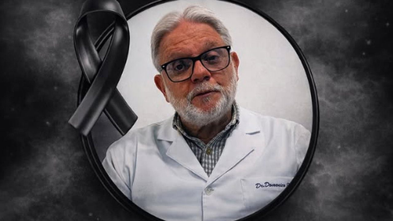 Homenagem ao Dr. José Domenico Sanglard Balbi, médico cardiologista de Nova Friburgo, com fita de luto.
