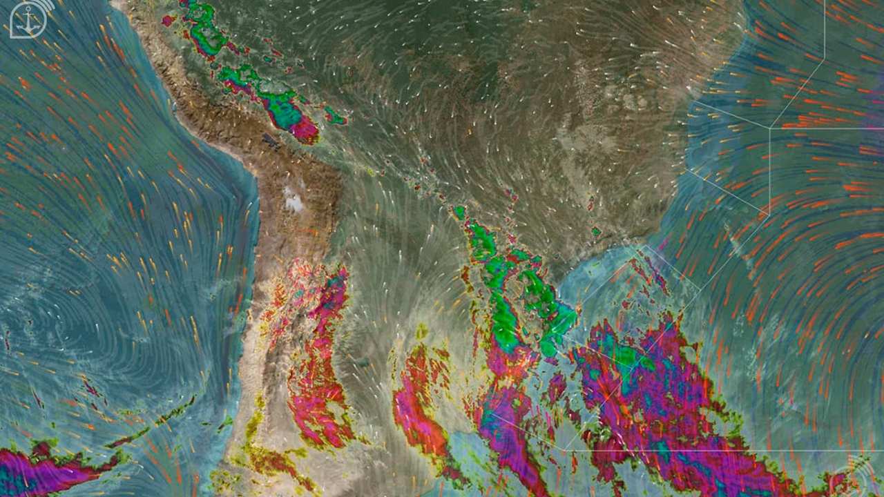 Imagem de satélite mostra padrões climáticos no Rio de Janeiro, com áreas de chuva e ventos.