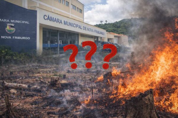 Incêndio florestal com Câmara Municipal de Nova Friburgo ao fundo, questionamentos sobre desmatamento.